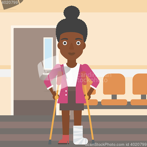 Image of Woman with broken leg and crutches.