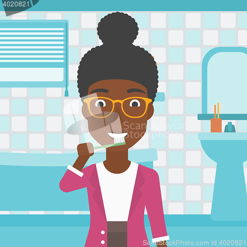 Image of Woman brushing teeth.