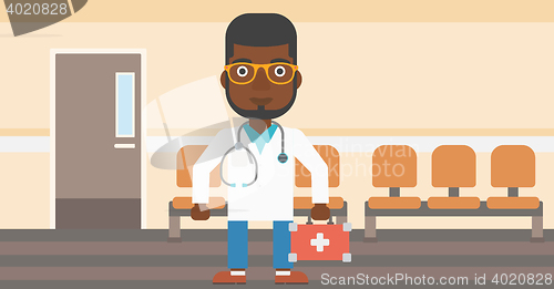 Image of Doctor with first aid box.