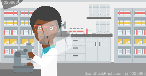 Image of Laboratory assistant with microscope.