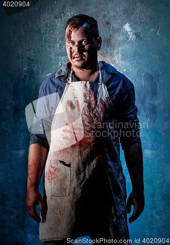 Image of Bloody Halloween theme: crazy killer as butcher