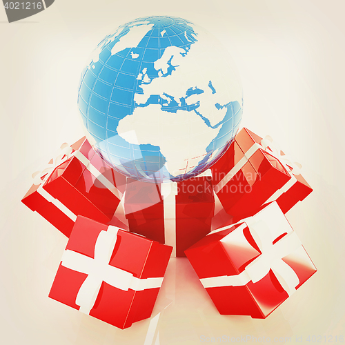 Image of Traditional Christmas gifts and earth. Global holiday concept . 