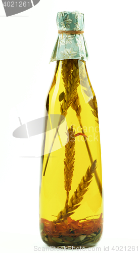 Image of Olive Oil with Stems of Cereals