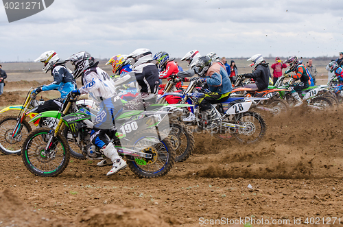 Image of Volgograd, Russia - April 19, 2015: Motorcycle racer took the race start, at the stage of the Open Championship Motorcycle Cross Country Cup Volgograd Region Governor