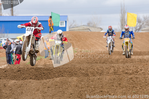 Image of Volgograd, Russia - April 19, 2015: Motorcycle racer on the track, at the stage of the Open Championship Motorcycle Cross Country Cup Volgograd Region Governor