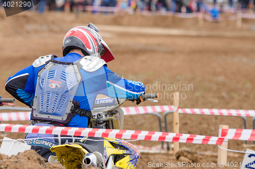 Image of Volgograd, Russia - April 19, 2015: Motorcycle racer is ready to take the start in the race to stage the Open Championship Motorcycle Cross Country Cup Volgograd Region Governor