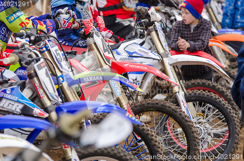 Image of Volgograd, Russia - April 19, 2015: close-up of motorcycles at the start of the competition, at the stage of the Open Championship Motorcycle Cross Country Cup Volgograd Region Governor