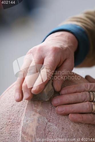 Image of sanding the stone