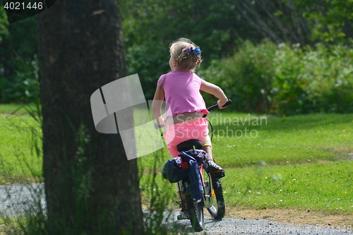 Image of Girl on a bicycle
