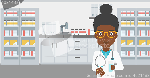 Image of Pharmacist giving pills and glass of water.