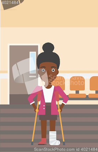 Image of Woman with broken leg and crutches.