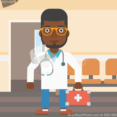Image of Doctor with first aid box.