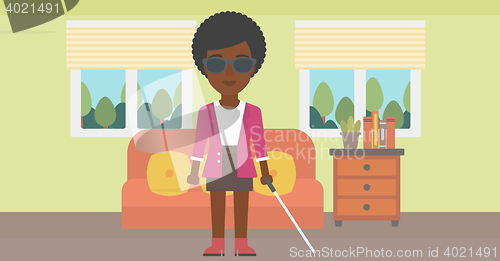 Image of Blind woman with stick.