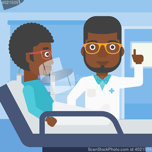 Image of Doctor visiting patient.