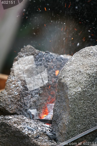 Image of small erupting volcano