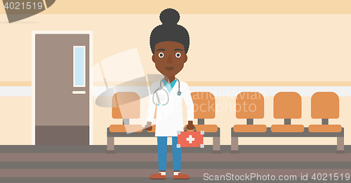 Image of Doctor with first aid box.