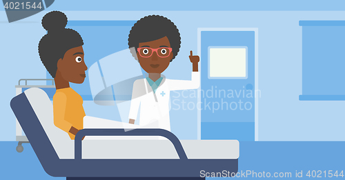 Image of Doctor visiting patient.