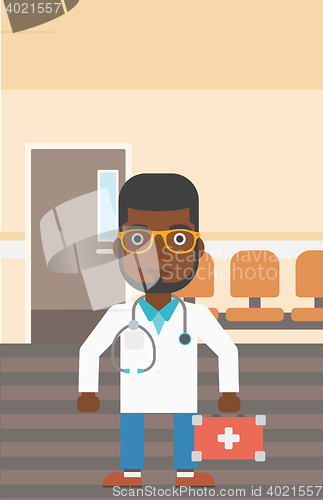 Image of Doctor with first aid box.