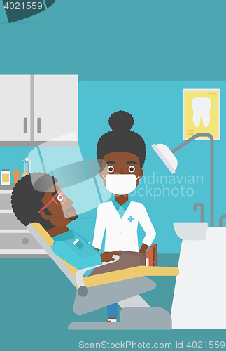 Image of Patient and doctor at dentist office.
