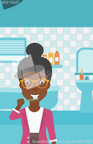 Image of Woman brushing teeth.