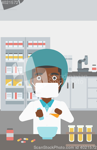 Image of Pharmacist preparing medication.