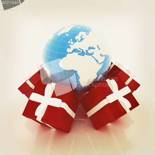 Image of Traditional Christmas gifts and earth. Global holiday concept . 