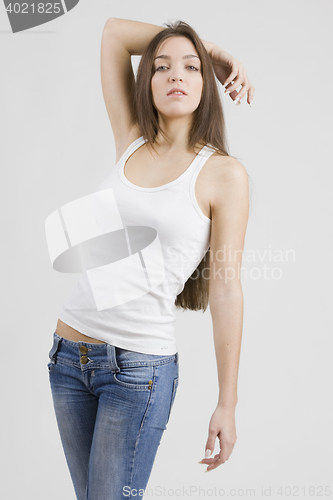 Image of stylish young woman posing in clear background