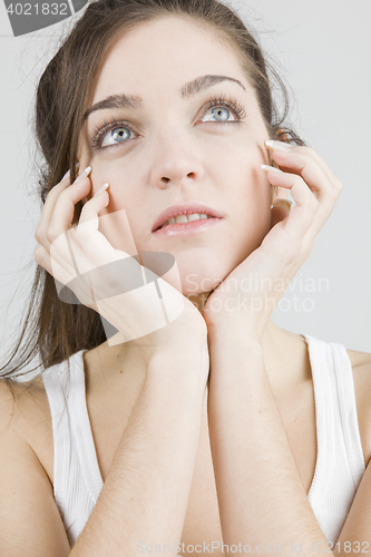 Image of stylish young woman posing in clear background