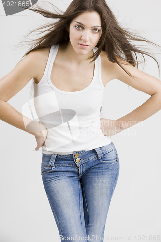 Image of stylish young woman posing in clear background