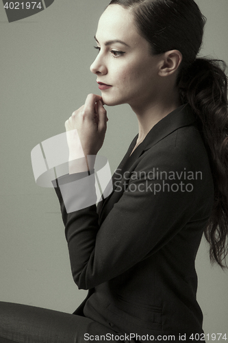 Image of stylish young woman posing in clear background