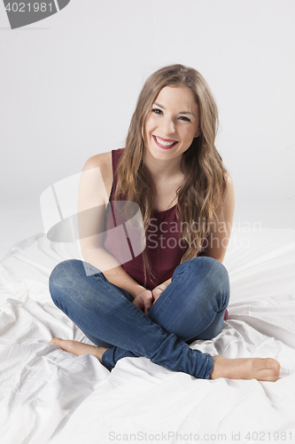 Image of stylish young woman posing in clear background