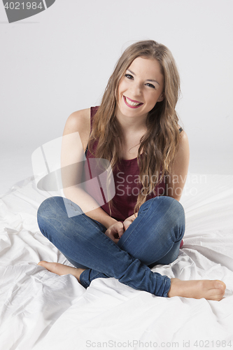 Image of stylish young woman posing in clear background