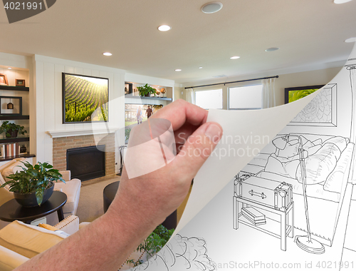 Image of Hand Turning Page of Custom Living Room Photograph to Drawing