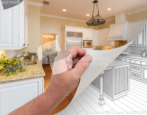 Image of Hand Turning Page of Custom Kitchen Photograph to Drawing