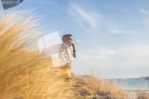 Image of Free active man enjoying beauty of nature.