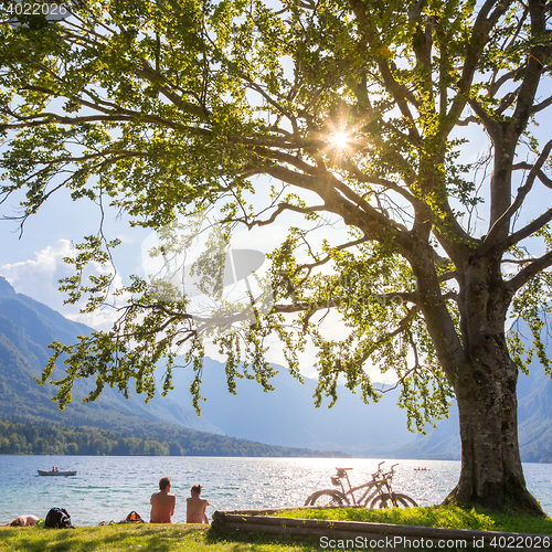 Image of Couple enjoying beautiful nature around lake Bohinj, Slovenia.