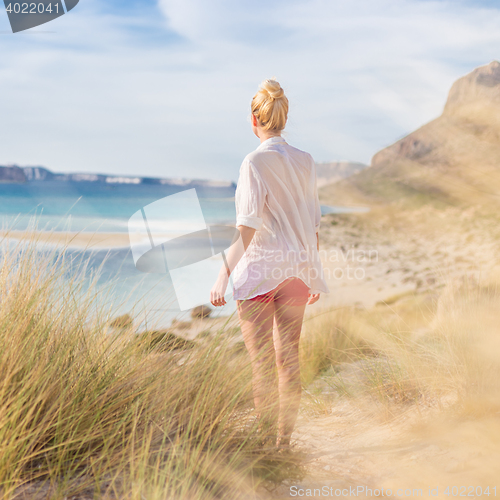 Image of Free Happy Woman Enjoying Sun on Vacations.