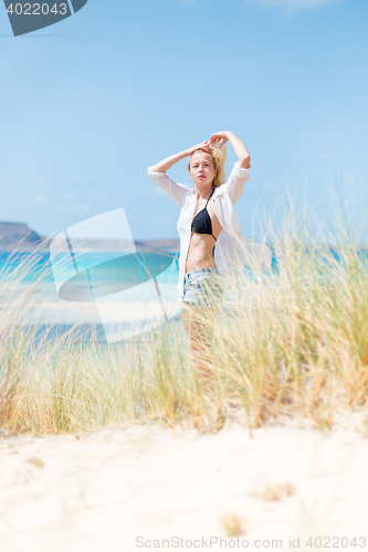 Image of Free Happy Woman Enjoying Sun on Vacations.