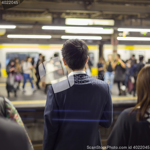 Image of Passengers traveling by Tokyo metro.