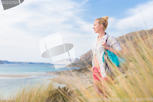 Image of Free Happy Woman Enjoying Sun on Vacations.