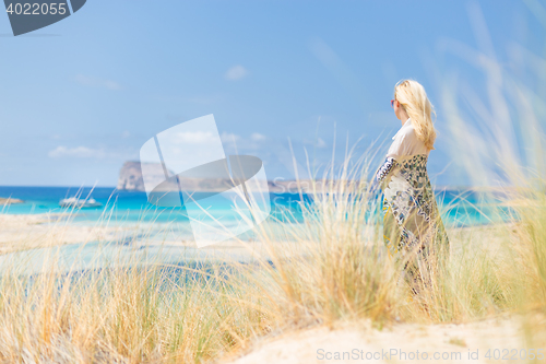 Image of Free Happy Woman Enjoying Sun on Vacations.