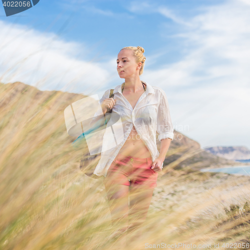 Image of Free Happy Woman Enjoying Sun on Vacations.