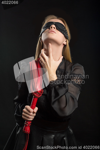 Image of Portrait of young beautiful woman in blindfold