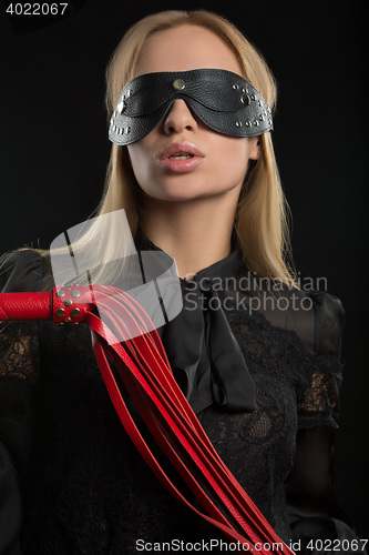 Image of Portrait of young beautiful woman in blindfold