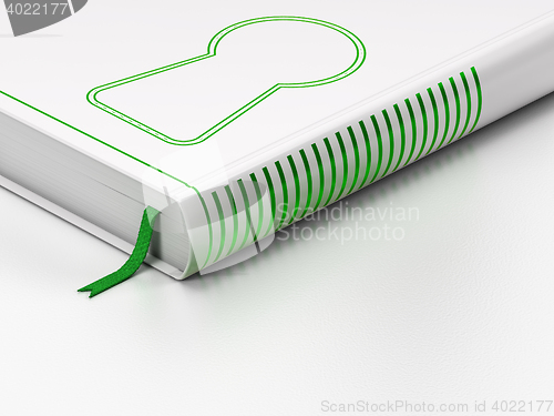 Image of Information concept: closed book, Keyhole on white background