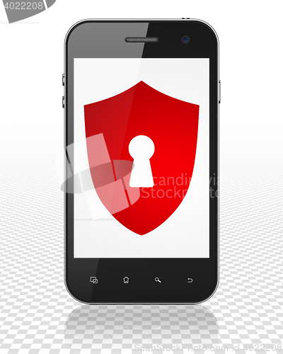 Image of Security concept: Smartphone with Shield With Keyhole on display