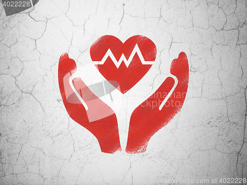 Image of Insurance concept: Heart And Palm on wall background