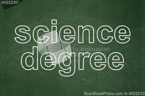 Image of Science concept: Science Degree on chalkboard background