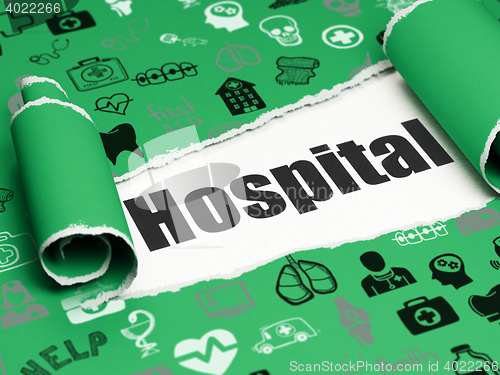 Image of Healthcare concept: black text Hospital under the piece of  torn paper