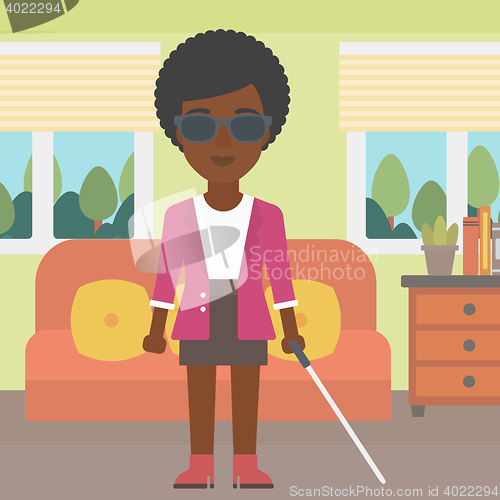 Image of Blind woman with stick.